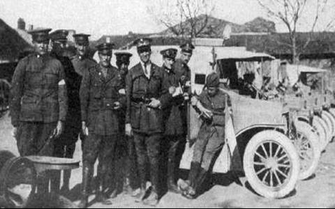 These are American ambulance drivers with ambulances in France (not ...