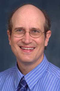 Associate Professor of Music, Theodore A. Schoen.