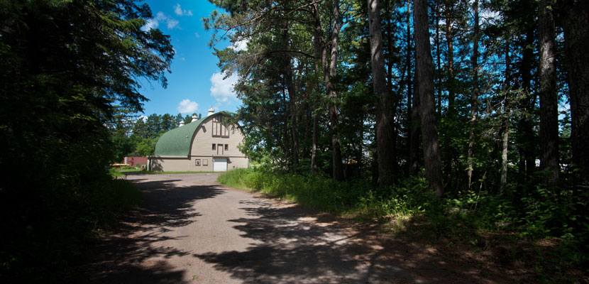 Dirt driveway leading to UMD farm