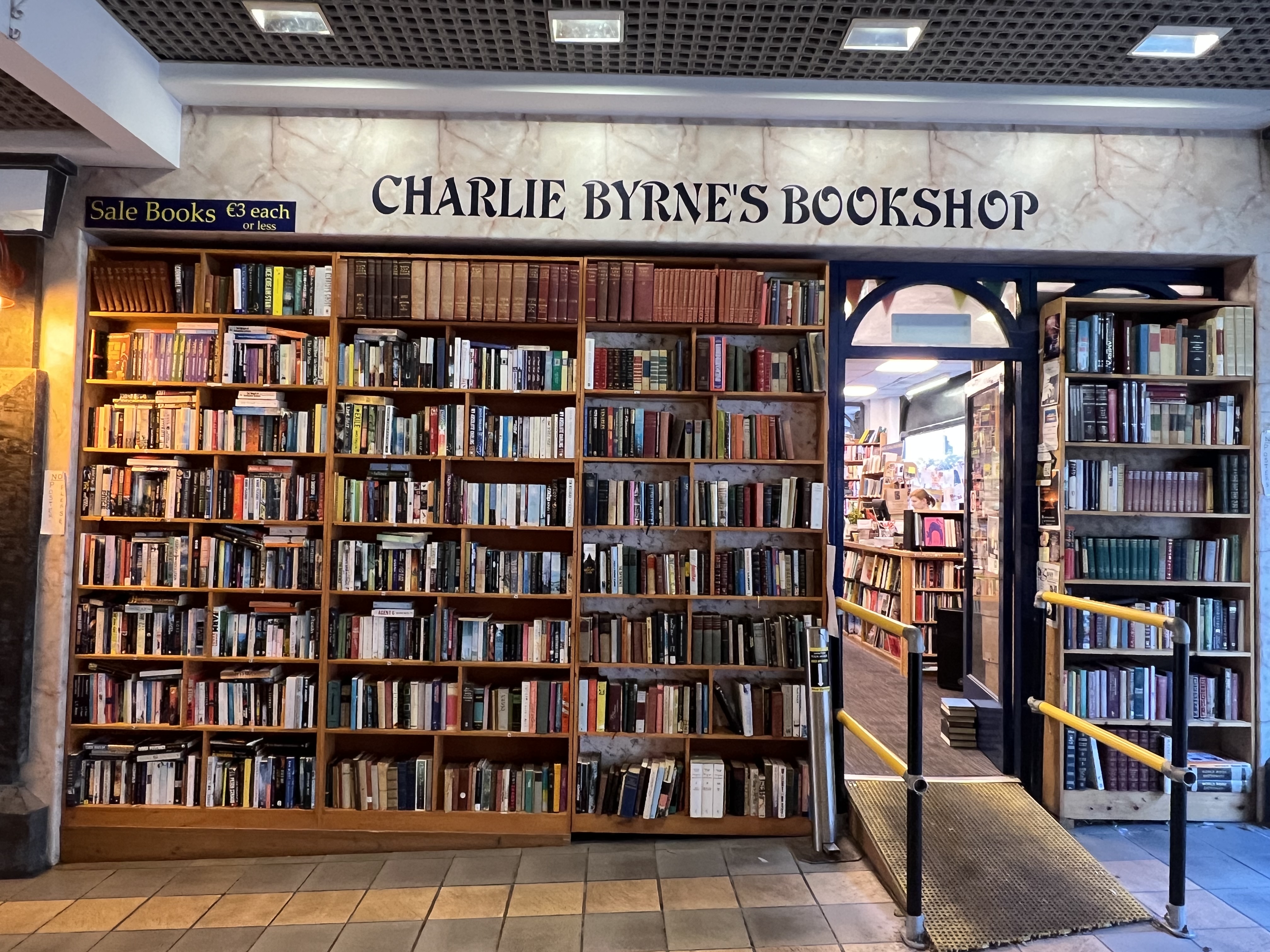 Entrance to book store filled with bookshelves